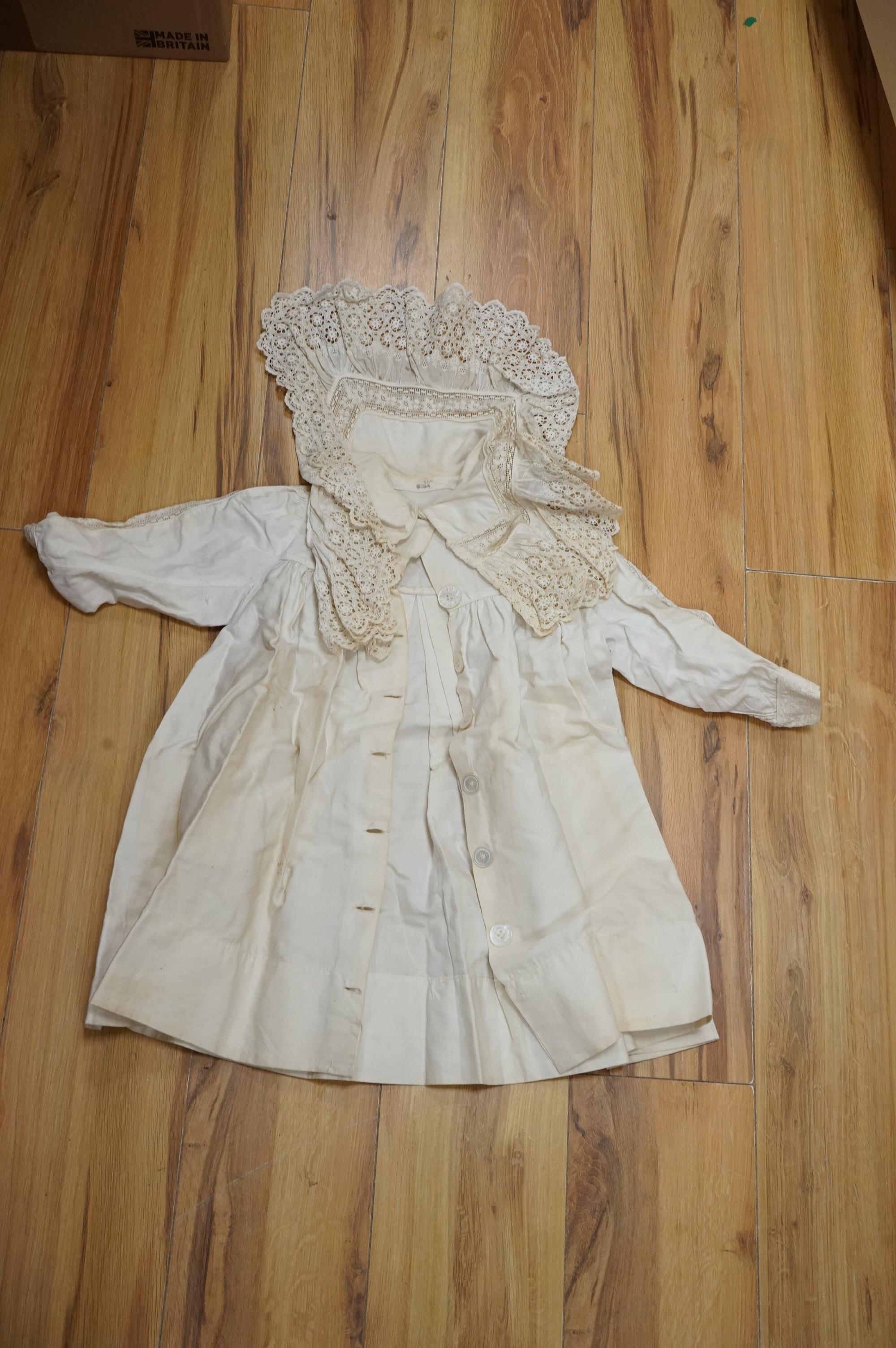 A collection Victorian textiles to include a lace christening gown, Irish crochet and a net baby gown